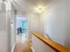 View of an upstairs hallway with access to an office and bedroom at 421 Sheoah Blvd # 5, Winter Springs, FL 32708