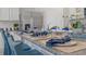Kitchen island with granite countertop and blue seating at 4225 Singing Mockingbird Blvd, Bartow, FL 33830