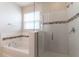 Bathroom with shower and bathtub at 4617 Harvest Row Ln, St Cloud, FL 34772