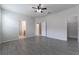 Primary bedroom with ceiling fan and ensuite bathroom access at 4617 Harvest Row Ln, St Cloud, FL 34772