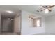 Open living space with a view into another room and hallway at 4617 Harvest Row Ln, St Cloud, FL 34772