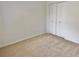 Simple bedroom with double door closet and neutral decor at 473 Oak Haven Dr # 473, Altamonte Springs, FL 32701