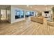 Community room with comfortable seating, fireplace, and wood-look floors at 473 Oak Haven Dr # 473, Altamonte Springs, FL 32701