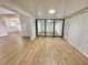 Bright dining area with wood-look floors and view into adjacent room at 473 Oak Haven Dr # 473, Altamonte Springs, FL 32701