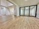 Bright dining area with wood-look floors and view into adjacent room at 473 Oak Haven Dr # 473, Altamonte Springs, FL 32701