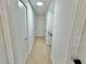 Hallway with beige carpet and access to other rooms at 473 Oak Haven Dr # 473, Altamonte Springs, FL 32701