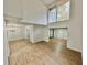 Open living room with hardwood floors and access to a sunroom at 473 Oak Haven Dr # 473, Altamonte Springs, FL 32701