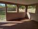 Enclosed patio with view of backyard at 508 Romano Ave, Orlando, FL 32807