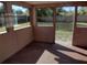 Enclosed patio overlooking the backyard at 508 Romano Ave, Orlando, FL 32807