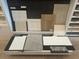 Selection of flooring, cabinetry, and tile options for the home at 5180 Gardenrow Dr, St Cloud, FL 34772