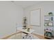 Well-organized home office featuring open shelving, stylish decor, and a functional workspace for productivity at 709 Marion Oaks Mnr, Ocala, FL 34473
