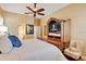 Comfortable main bedroom includes a decorative armoire and neutral color palette at 711 Ironwood Ct, Winter Springs, FL 32708