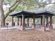 Covered pavillion with picnic tables in a leafy park setting at 711 Ironwood Ct, Winter Springs, FL 32708