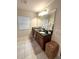 Bathroom with double vanity and granite countertop at 7835 Syracuse Dr, Clermont, FL 34714
