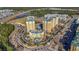 Aerial view of resort community showing buildings and landscaping at 8101 Resort Village Dr, Orlando, FL 32821
