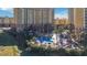 Aerial view of resort community with pool and pirate ship water feature at 8101 Resort Village Dr, Orlando, FL 32821