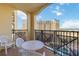 Private balcony with table and chairs, offering scenic views at 8101 Resort Village Dr, Orlando, FL 32821