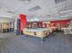 Game room with pool tables and arcade games at 8101 Resort Village Dr, Orlando, FL 32821