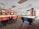 Game room with air hockey and arcade games at 8101 Resort Village Dr, Orlando, FL 32821