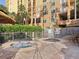 Two hot tubs near resort building with lush landscaping at 8101 Resort Village Dr, Orlando, FL 32821