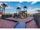Community playground with slides and climbing structures at 8101 Resort Village Dr, Orlando, FL 32821