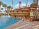 Pirate ship water feature at the resort pool with water slide at 8101 Resort Village Dr, Orlando, FL 32821