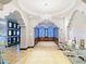 Spa reception area with elegant decor and shelves at 8101 Resort Village Dr, Orlando, FL 32821