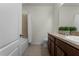 Bathroom with dark brown vanity and shower at 9053 Shepton St, Orlando, FL 32825