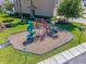 Community playground with a slide and climbing structures at 9053 Shepton St, Orlando, FL 32825