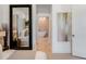 Hallway view showcasing modern design elements connecting the bedroom and bathroom at 9697 Bryanston Dr, Orlando, FL 32827