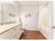 Clean bathroom with granite countertop, bathtub, and shower at 5356 Diplomat Ct # 107, Kissimmee, FL 34746
