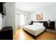 Spacious main bedroom with a king-size bed and plenty of natural light at 5356 Diplomat Ct # 107, Kissimmee, FL 34746