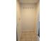 Small hallway with coat hooks and tile floor at 1013 Park Ridge Cir, Kissimmee, FL 34746