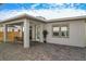 Relaxing covered patio, featuring a seating area and fire pit at 10175 Peebles St, Orlando, FL 32827