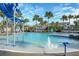 Resort-style pool with water features and lounge chairs at 10175 Peebles St, Orlando, FL 32827