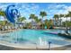 Resort-style pool with water features and lounge chairs at 10175 Peebles St, Orlando, FL 32827