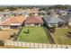 Aerial view showcasing home's backyard and neighborhood at 125 Silver Maple Rd Rd, Groveland, FL 34736