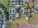 Aerial view of community tennis courts and surrounding area at 125 Silver Maple Rd, Groveland, FL 34736