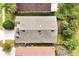 Overhead view of house roof and surrounding landscape at 12821 Gettysburg Cir, Orlando, FL 32837