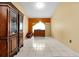 Bright bedroom with tile floors and built-in wooden cabinets at 12821 Gettysburg Cir, Orlando, FL 32837