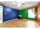 Bedroom with laminate wood floors and two-toned walls at 12821 Gettysburg Cir, Orlando, FL 32837