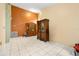 Living room with tile floors and wooden cabinets at 12821 Gettysburg Cir, Orlando, FL 32837