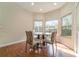 Charming breakfast nook with wood flooring and lots of natural light at 1501 Edgewater Dr, Mount Dora, FL 32757