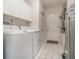 Laundry room with washer, dryer, and exterior access at 1501 Edgewater Dr, Mount Dora, FL 32757