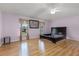 Main bedroom with wood flooring and ceiling fan at 1605 S Mary St, Eustis, FL 32726