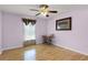 Bedroom with hardwood floors and a desk at 1605 S Mary St, Eustis, FL 32726