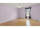 Light and bright bedroom with ceiling fan and laminate wood floors at 1605 S Mary St, Eustis, FL 32726