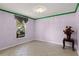 Bright dining room with tile flooring and a decorative trim at 1605 S Mary St, Eustis, FL 32726