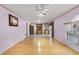 Living room with hardwood floors and open floor plan at 1605 S Mary St, Eustis, FL 32726