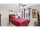 Charming bedroom with a full-size bed and movie theme decor at 16133 Pebble Bluff Loop, Winter Garden, FL 34787